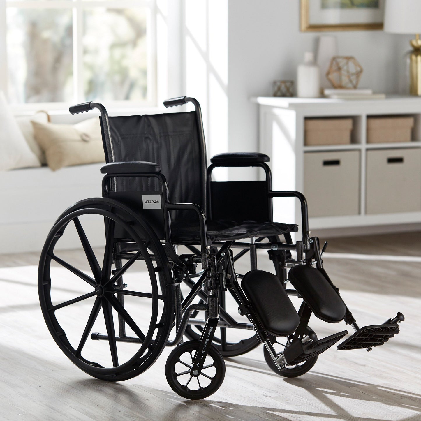 McKesson Wheelchair Dual Axle Desk Length Arm Swing-Away Elevating Legrest Black Upholstery 18 Inch Seat Width Adult 300 lbs. Weight Capacity (1065277_EA)