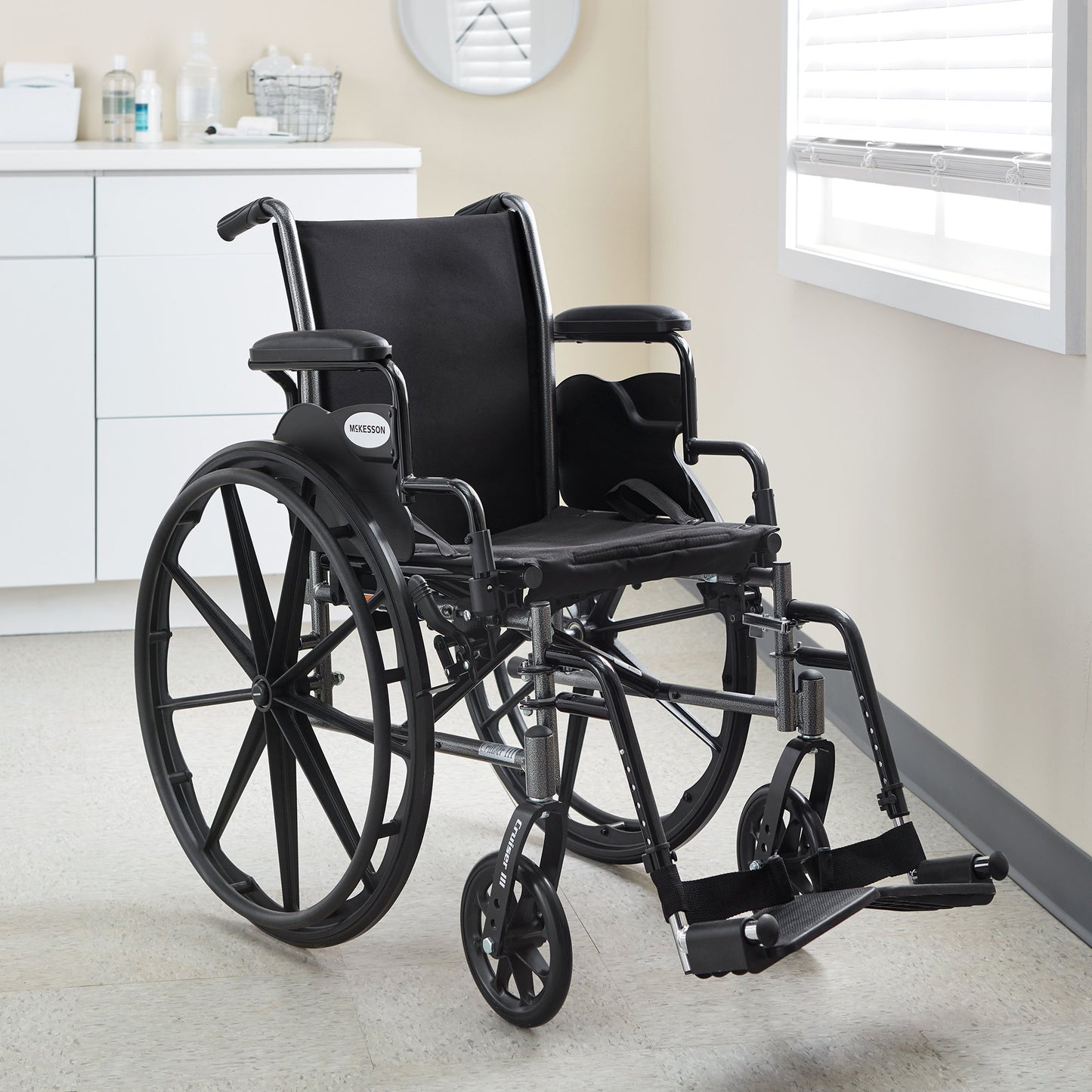 McKesson Lightweight Wheelchair Dual Axle Desk Length Arm Swing-Away Footrest Black Upholstery 16 Inch Seat Width Adult 300 lbs. Weight Capacity (1065282_EA)