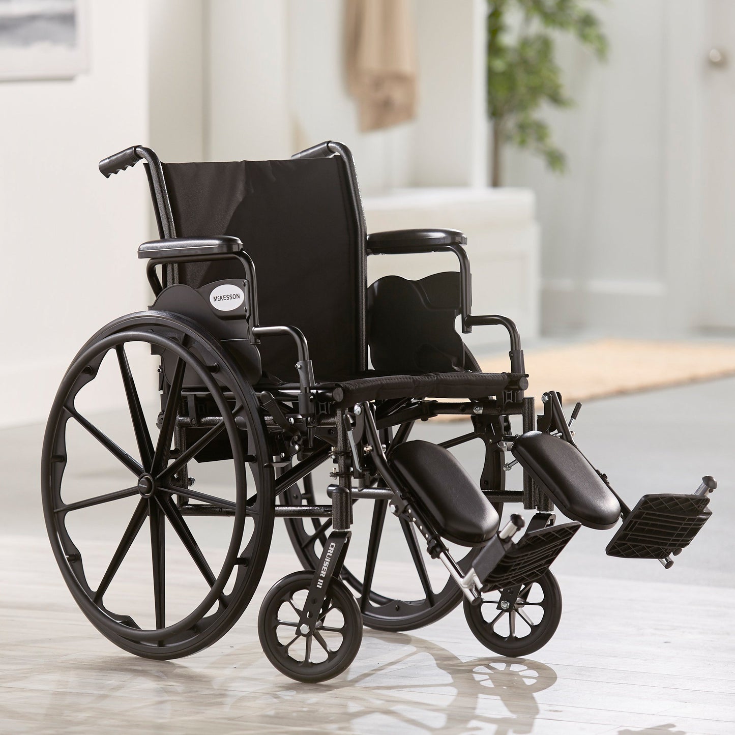 McKesson Lightweight Wheelchair Dual Axle Desk Length Arm Swing-Away Elevating Legrest Black Upholstery 20 Inch Seat Width Adult 300 lbs. Weight Capacity (1065287_EA)