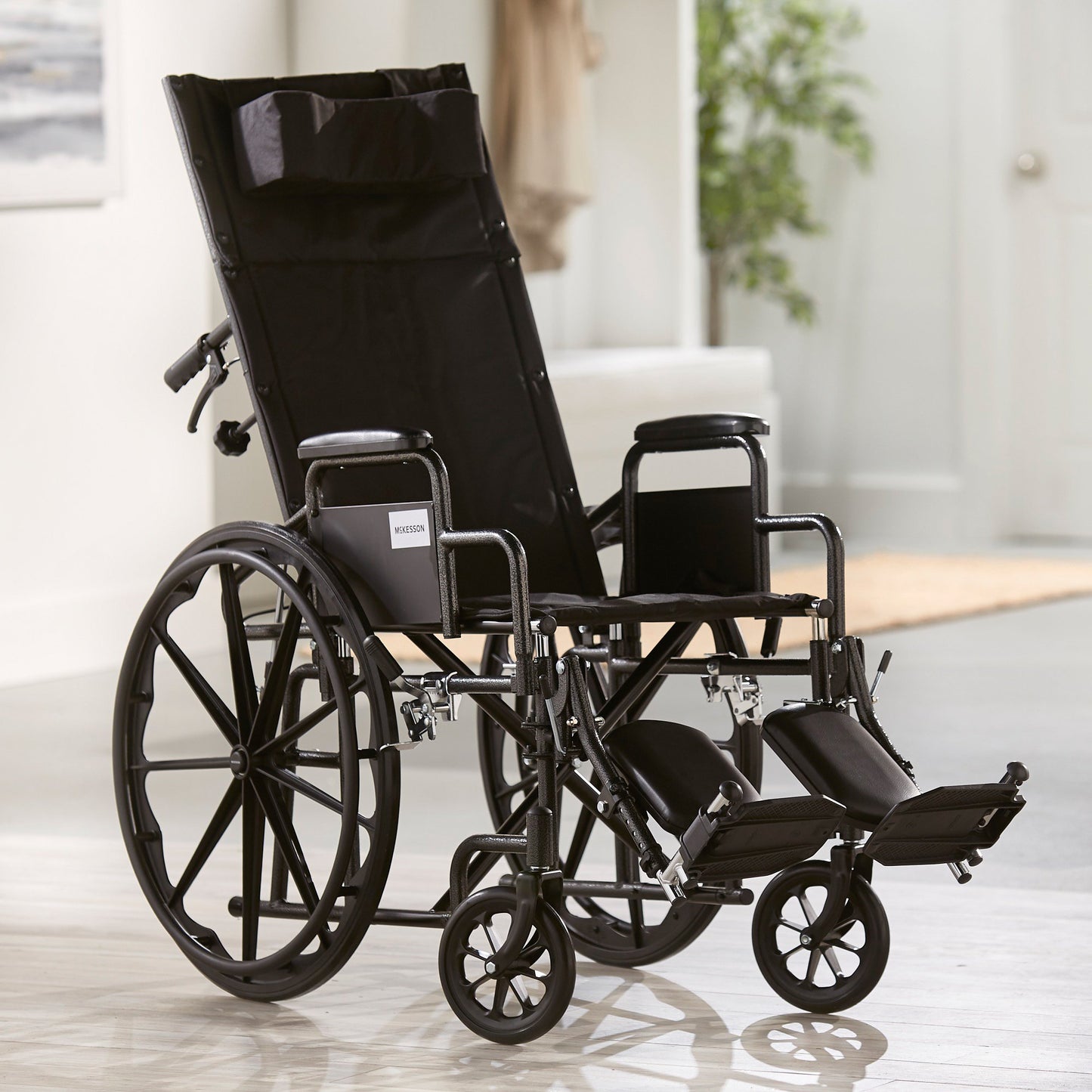 McKesson Reclining Wheelchair Desk Length Arm Swing-Away Elevating Legrest Black Upholstery 18 Inch Seat Width Adult 300 lbs. Weight Capacity (1065290_EA)