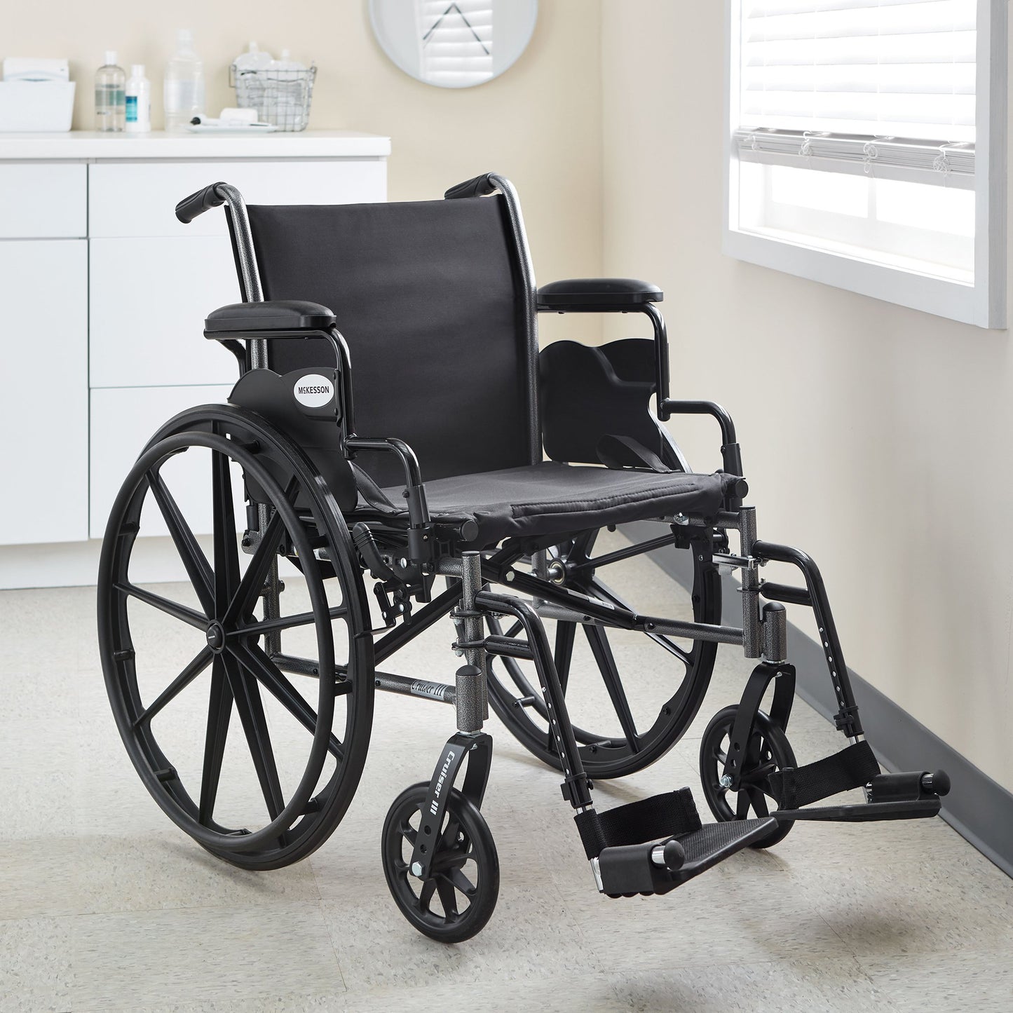 McKesson Lightweight Wheelchair Dual Axle Desk Length Arm Swing-Away Footrest Black Upholstery 20 Inch Seat Width Adult 300 lbs. Weight Capacity (1065286_EA)