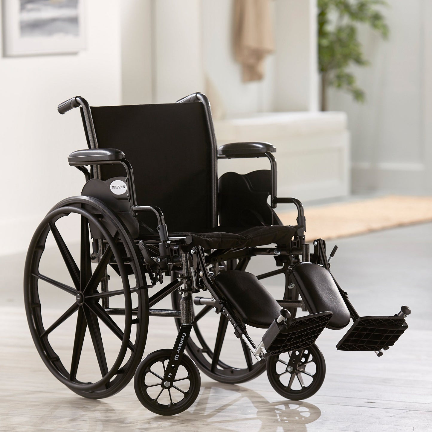 McKesson Lightweight Wheelchair Dual Axle Desk Length Arm Swing-Away Elevating Legrest Black Upholstery 18 Inch Seat Width Adult 300 lbs. Weight Capacity (1065285_EA)