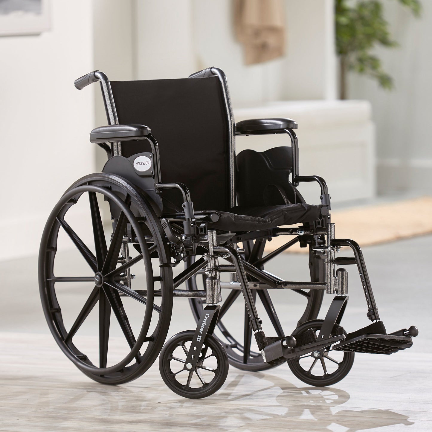 McKesson Lightweight Wheelchair Dual Axle Desk Length Arm Swing-Away Footrest Black Upholstery 16 Inch Seat Width Adult 300 lbs. Weight Capacity (1065282_EA)