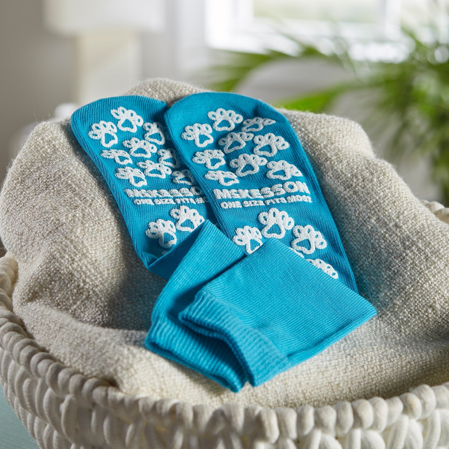 McKesson Paw Prints® Slipper Socks Unisex Adult One Size Fits Most Single Tread Single Patient Use Teal (475019_CS)