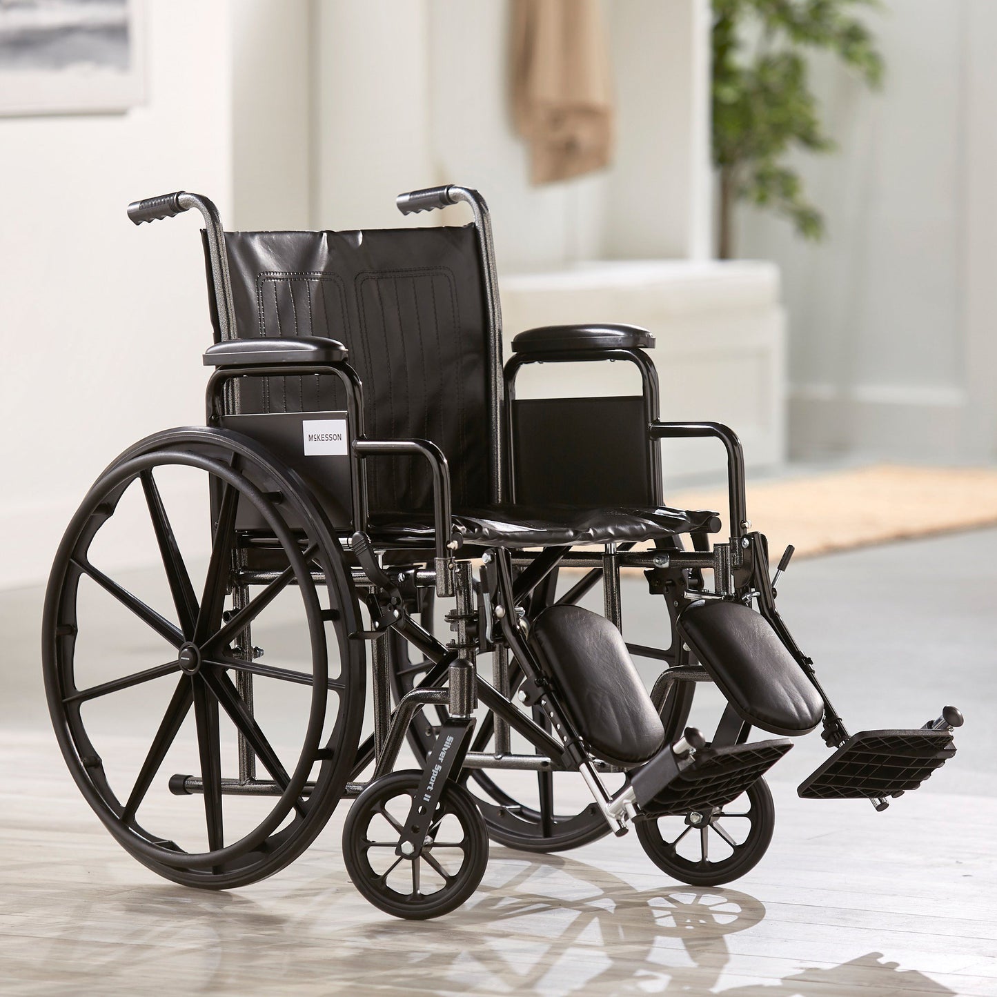 McKesson Wheelchair Dual Axle Desk Length Arm Swing-Away Elevating Legrest Black Upholstery 20 Inch Seat Width Adult 350 lbs. Weight Capacity (1065279_EA)