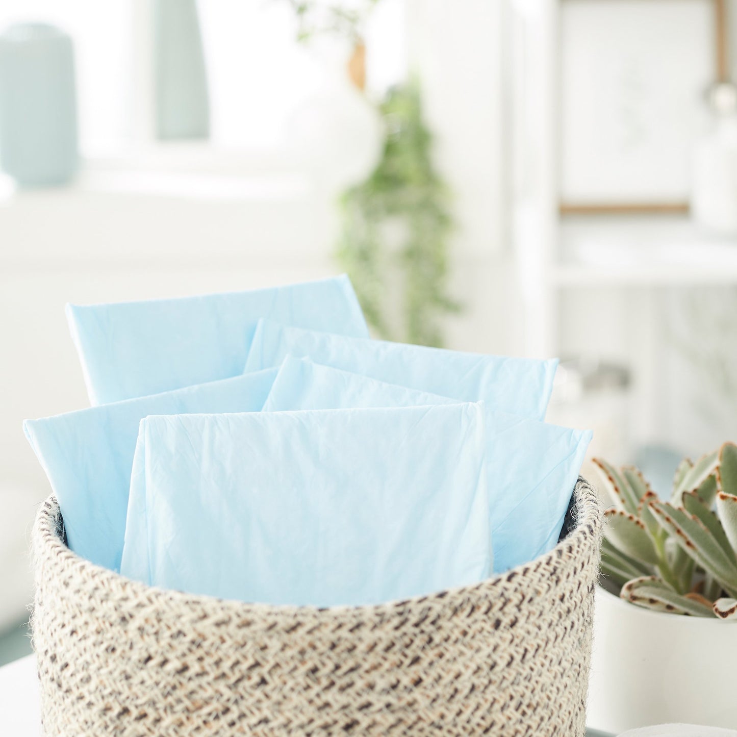 TENA® Regular Disposable Underpad 17 X 24 Inch Fluff Light Absorbency (450009_CS)