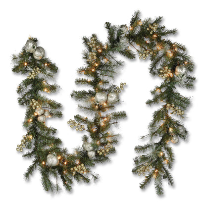 National Tree Company® Pre-Lit Glittery Pine Pomegranate Garland, AC Powered, Clear Incandescent Lights, 108" Long, Green (NTTGTP13029B1)