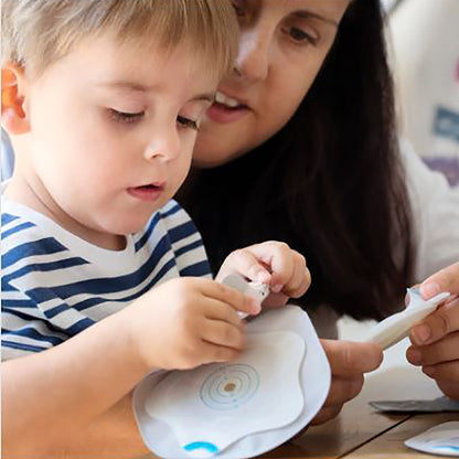 SenSura® Mio Kids Ostomy Barrier Trim to Fit, Standard Wear Adhesive Coupling Without Flange Purple Code System 0 to 1-1/16 Inch Opening (1124383_BX)