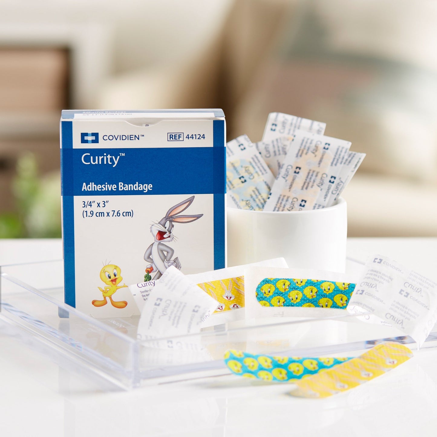 Curity™ Adhesive Strip 3/4 X 3 Inch Plastic Rectangle Kid Design (Assorted Looney Tunes) Sterile (867805_BX)