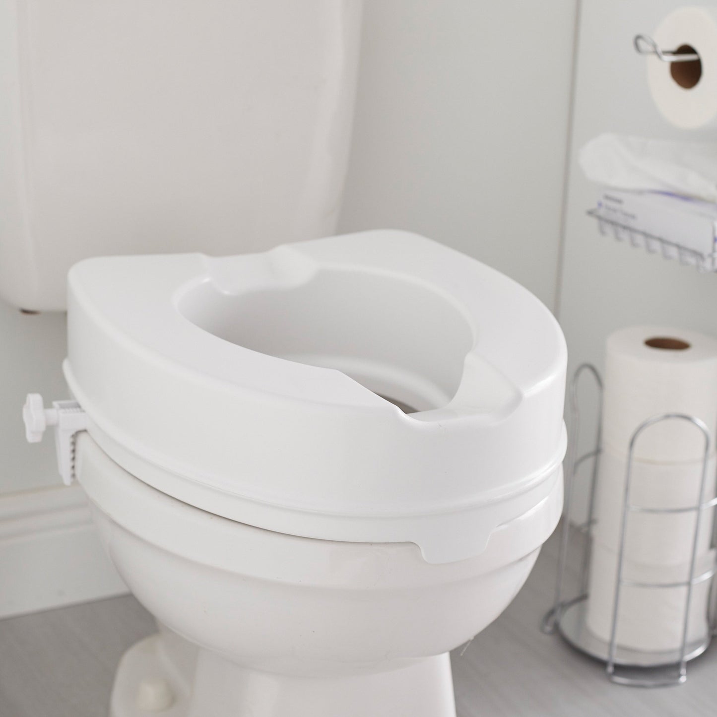 McKesson Raised Toilet Seat 4 Inch Height Standard / Elongated 400 lbs. Weight Capacity (1095384_EA)